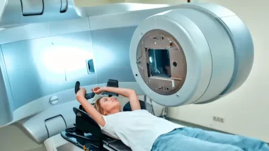 Woman lying on a medical machine