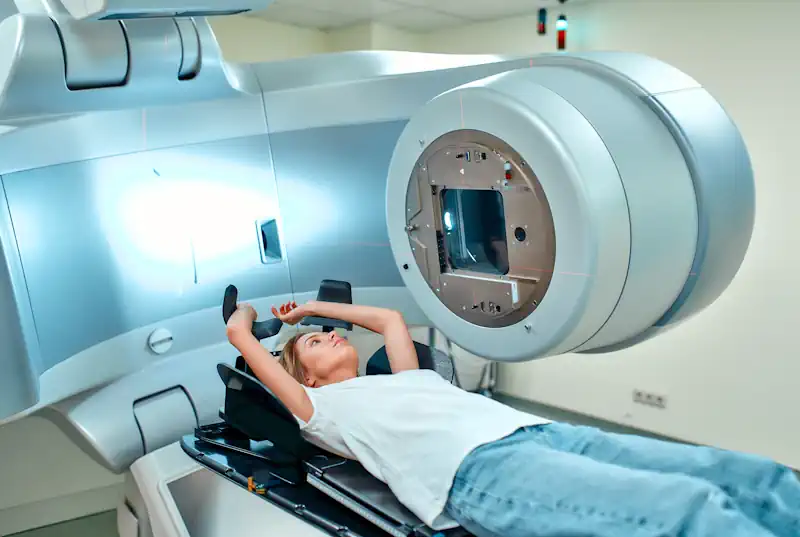 Woman lying on a medical machine